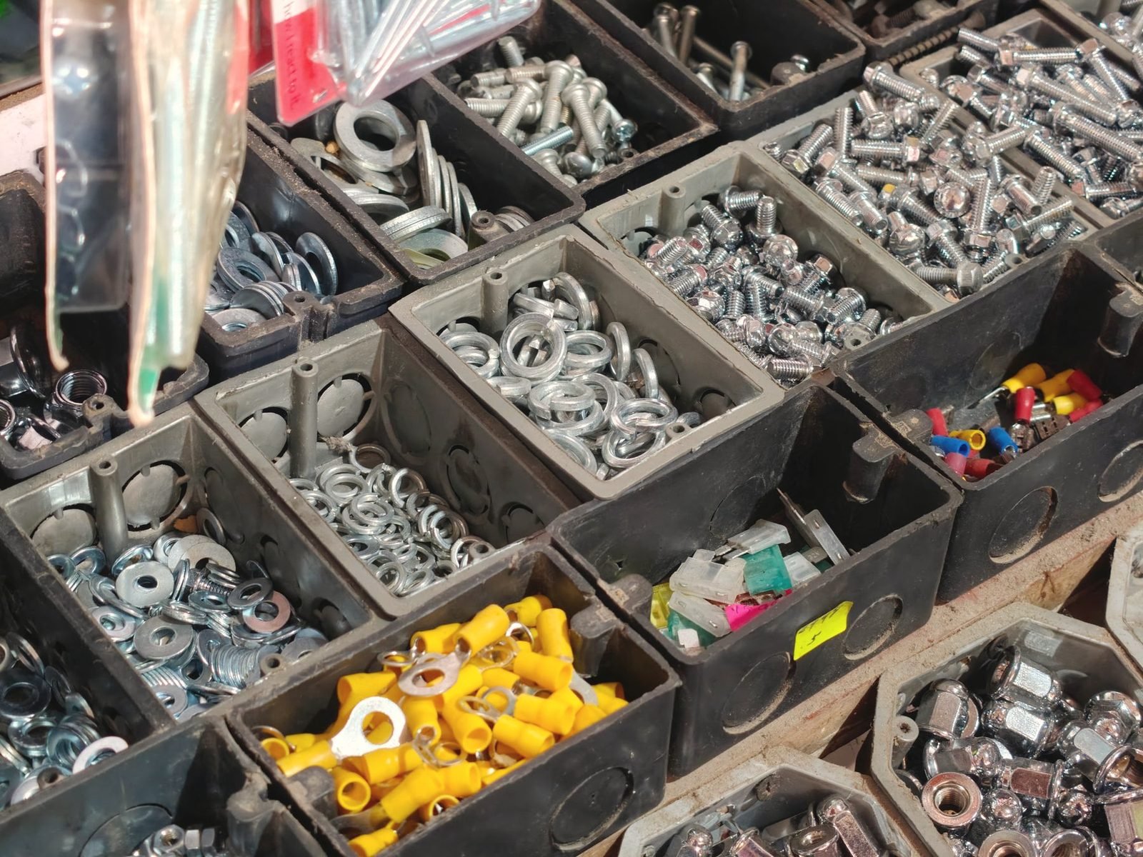 Bins of washers, nuts and fittings sorted by size